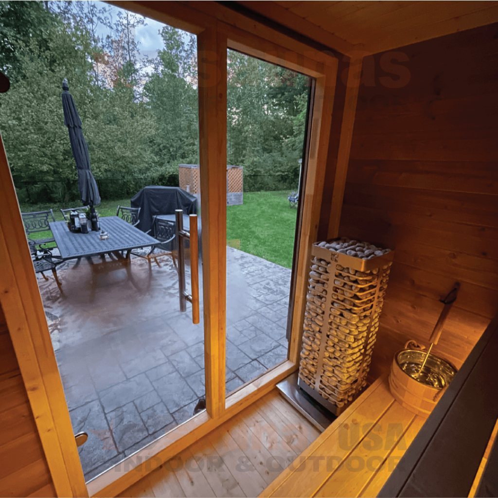 Outdoor sauna kit. Cedar sauna interior with heater.